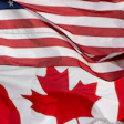 The flags of Canada and the United States fly over a stadium in Ottawa, Saturday, Sept. 12, 2026.