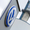 Volkswagen logo on dealership signage with blue and white circular emblem design