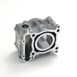 Aluminum engine cylinder head with circular bore opening and mounting bolt holes