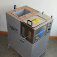 Industrial ultrasonic cleaning machine with wooden top basin and control panel featuring MIET and Pro Ultrasonics branding