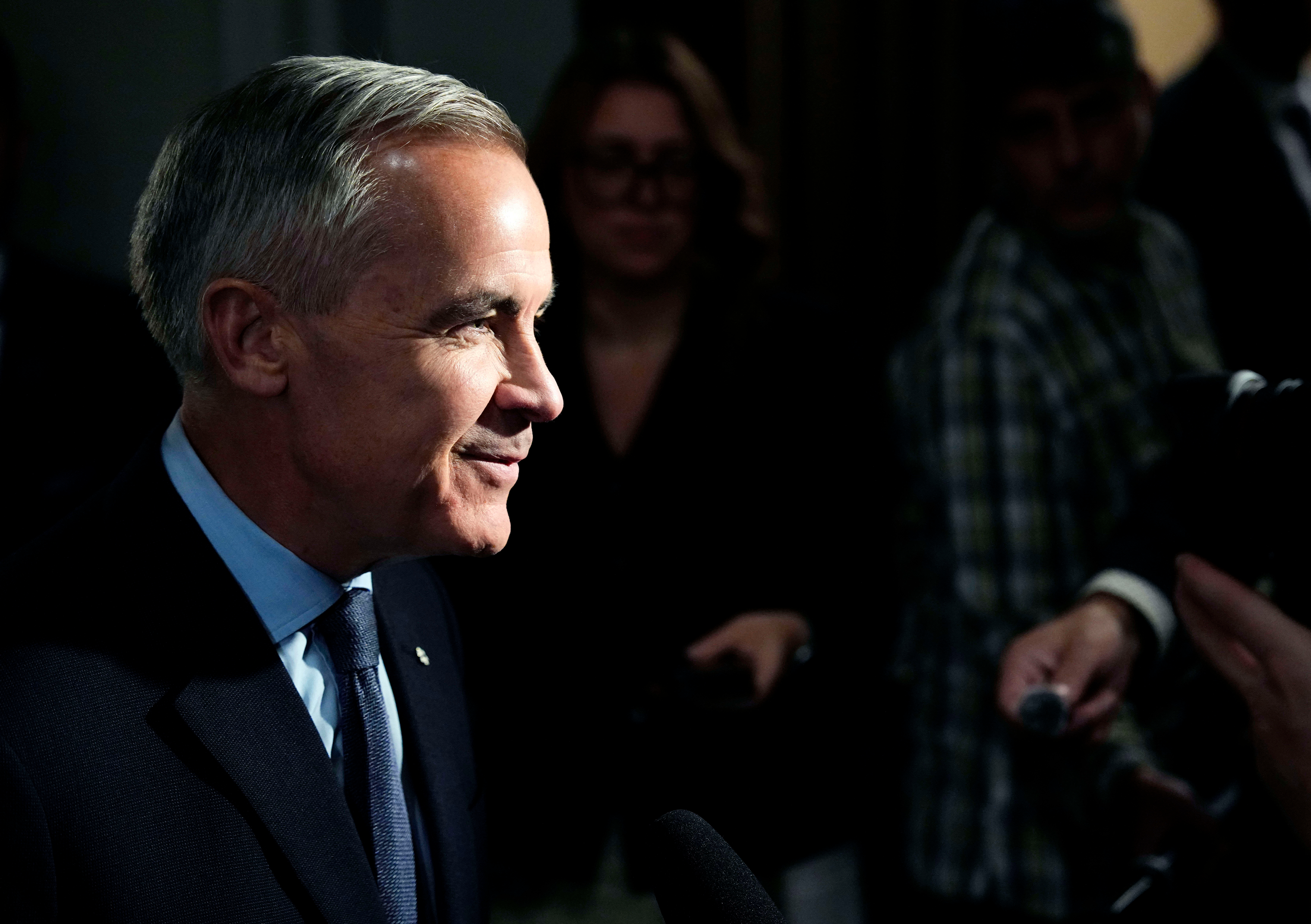 Prime Minister Mark Carney takes questions from journalists as he arrives for a meeting of the federal cabinet on Parliament Hill in Ottawa, Oct. 20, 2026.