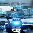 Futuristic car interior with digital dashboard displays and blue holographic interface elements representing autonomous vehicle technology