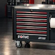 Sonic S19 tool chest with red and black drawers, stainless steel top, and paper towel holder on casters
