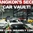 Man in baseball cap standing in multi-level car storage facility with 50+ rare vehicles and low mileage cars