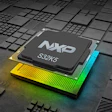 NXP S32K5 microprocessor chip on illuminated circuit board with geometric patterns