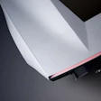 CORSAIR gaming device with white and red design on dark background