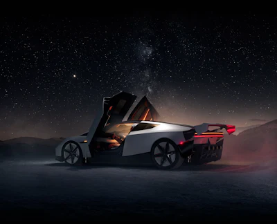 Futuristic red and white sports car with gullwing doors under starry night sky in desert landscape